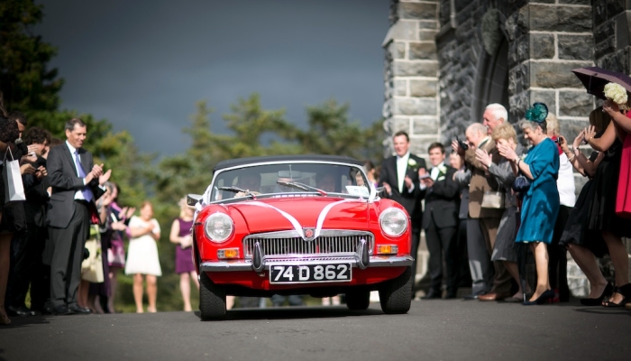 red vintage wedding car
